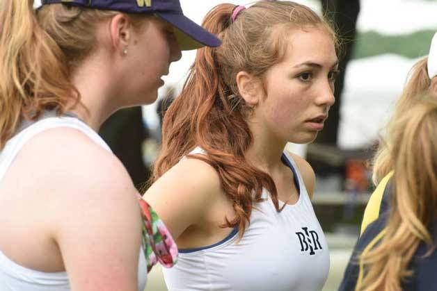 BHS Senior and veteran rower Amina Lee listens in a pre-race meeting at the NW Championships.