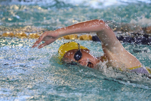 Bainbridge swamped Eastside Catholic in winning eight of 12 events during the Spartans' home opener in girls swimming and diving.