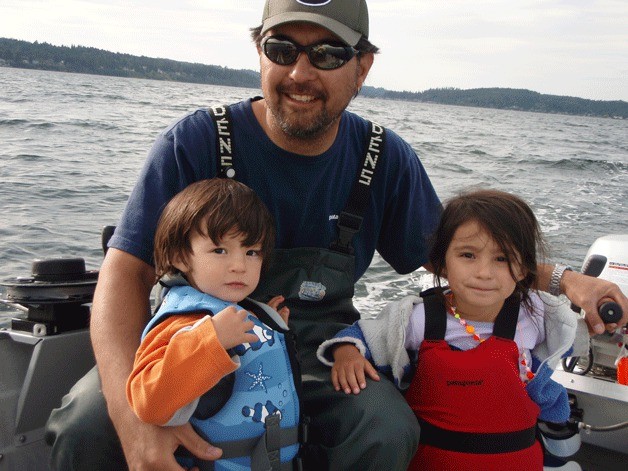 Island author Dylan Tomine takes a fishing trip with his two children