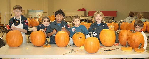 The boys of Cub Scout Pack 4545 at last year’s pumpkin carving day event