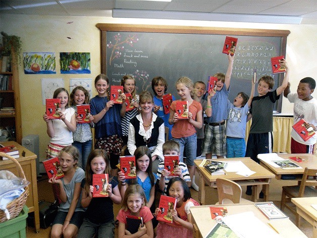 Wendy Prust ended her teaching career at the Madrona School this June but left her students with a special gift. Each third-grader received a copy of a book in the “Smells Like Dog” trilogy that they have been reading throughout the year.