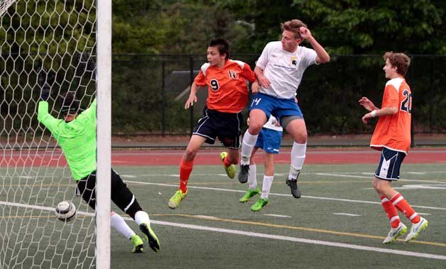 The Spartans’ sole regular goal in Monday’s match against Eastside Catholic was scored by Sam Casad (partially hidden)