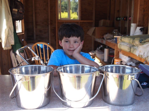 Weston is in charge of cleaning the blueberry buckets for the Bainbridge Island Blueberry Company.