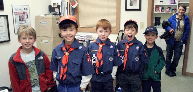 Cub Scouts from Pack 4496 pause for a photo during their tour of the Bainbridge Island Review.