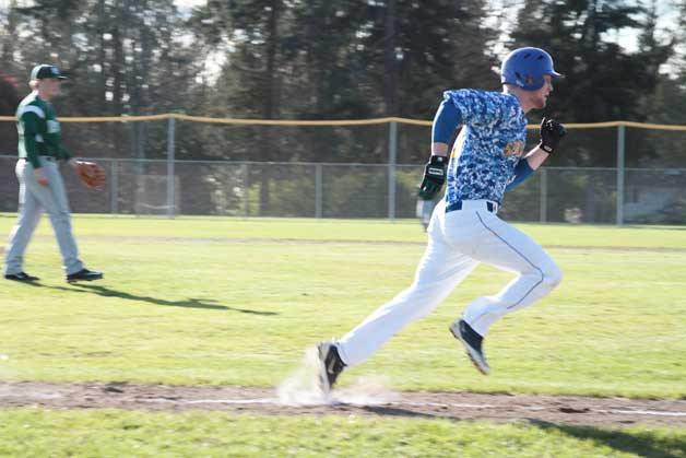 Returning Spartan slugger Jack O’Neill scored a home run during the varsity baseball team’s first game of the year Wednesday at home against Port Angeles. Friday