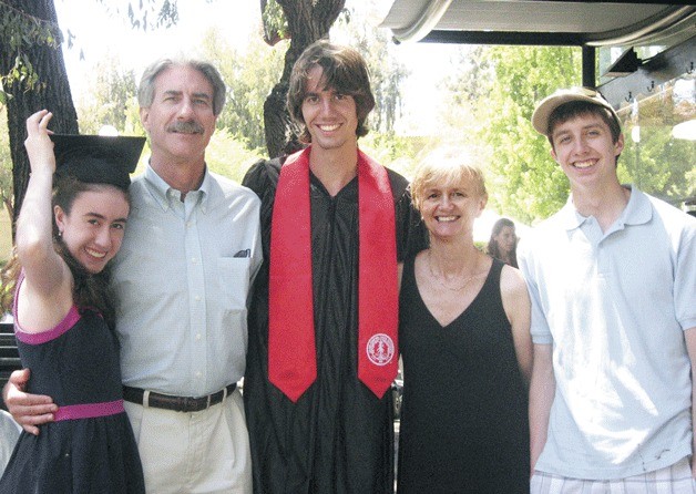Jonathon Potter stands with his family after graduating from Stanford University.