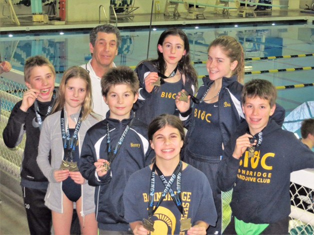 Members of the Bainbridge Island Dive Club at the 2015 Northwest Holiday Classic. In front: Morgan Dunscombe