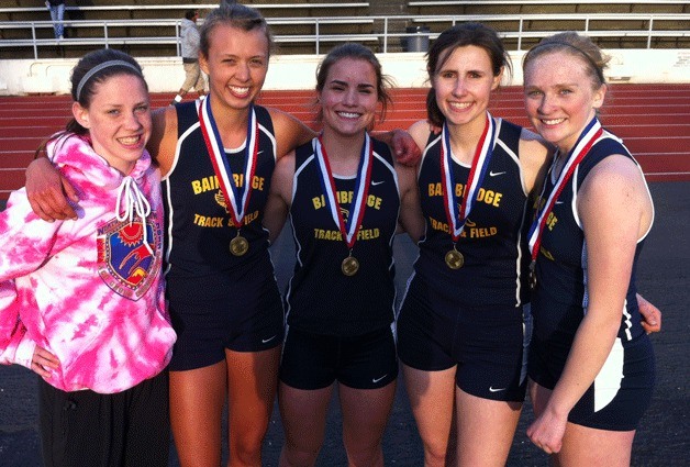 Spartan medalists are all smiles after the awards ceremony at the Tacoma Invite. Mikelle Ackerley won the 800 meter race and was alternate runner for the 4x400 meter relay; Pearl Terry won the 400-meter race and ran the fourth leg on the 4x400 meter relay; Lindsay Wienkers ran the third leg of the 4x400 meter relay; Isabel Ferguson was fifth in the high jump and ran the second leg of the 4x400 meter relay; and Danielle Bogardus ran the first leg of the 4x400 relay.