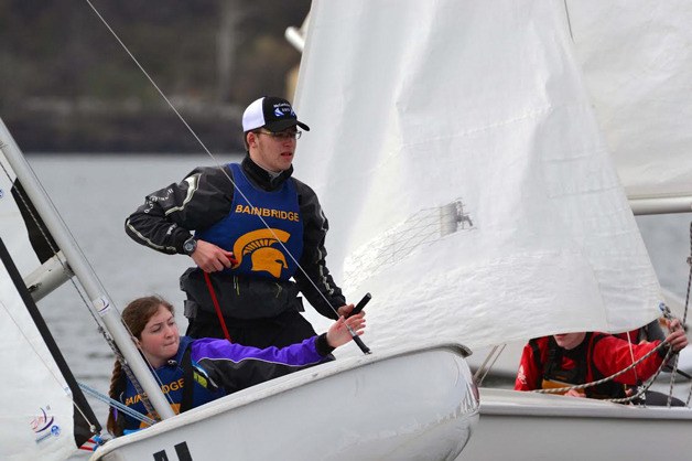 Skipper Blake Bentzen and crew Nicole Sanford jibe to stay in clear air on a downwind leg.