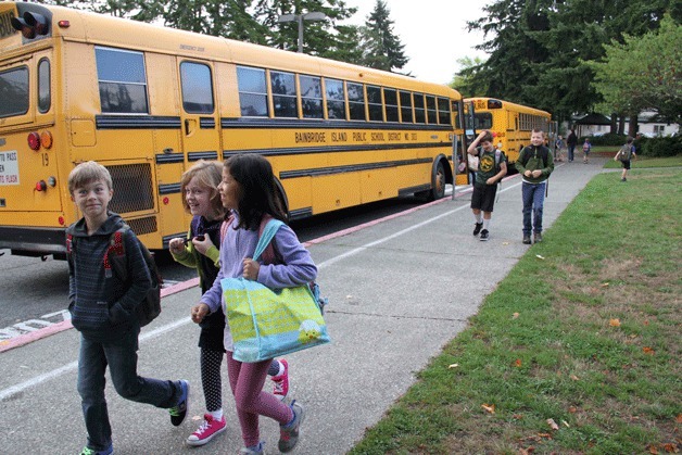 Students arrive at Ordway Elementary for the start of school on Wednesday.