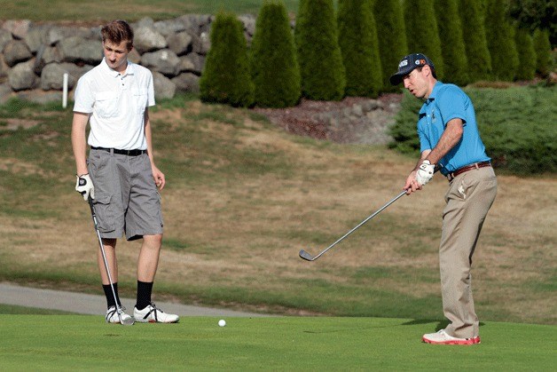 Head Coach and BHS math teacher Joe Lanza practices with returning team member Nate Boegl during a practice session.