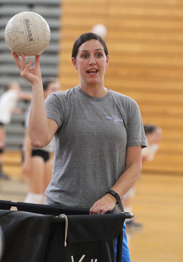 Spartan Head Coach Holly Rohrbacher guides her team through drills during volleyball practice at Bainbridge High last week.