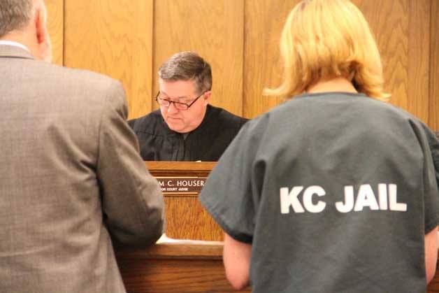 Jessica M. Fuchs appears before Kitsap Superior Court Judge William C. Houser at her arraignment in May. Fuchs entered a “not guilty” plea on two felony charges and one gross  misdemeanor charge that stem from an alleged improper relationship with a 16-year-old student.