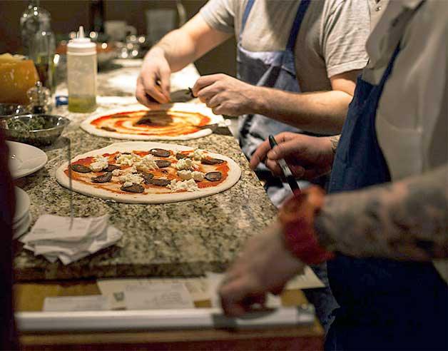 McGill’s staff tops a pie using San Marzano tomatoes and Buffalo mozzarella. The standards for authenticity are completely objective