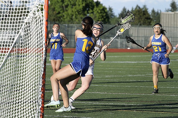 Sophia Hagstromer moves in for one of her six goals against Stadium High during the Spartans’ first playoff game.