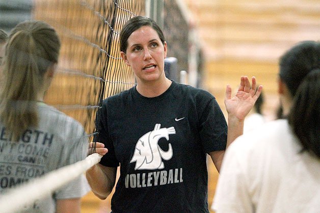 Spartan Coach Holly Rohrbacher leads her varsity volleyball team through practice earlier this week.