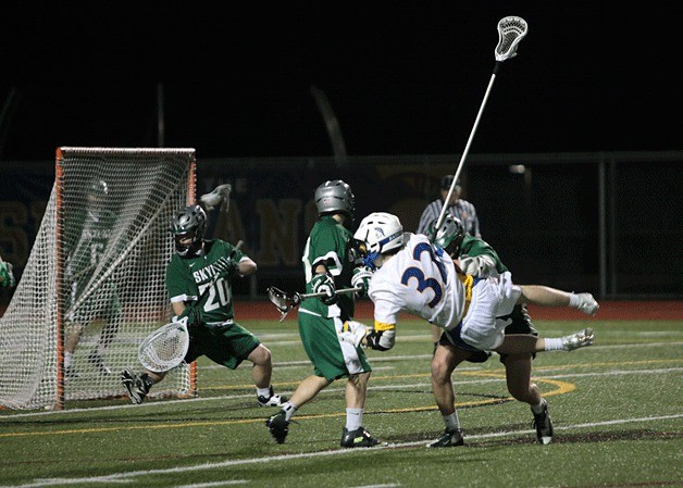 The Bainbridge High School varsity lacrosse team defeated the visiting Skyline Spartans at their first home game of the season Tuesday