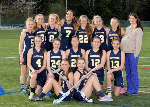 The undefeated BHS girls JV lacrosse team gathers for a photo. The team ended the season with an overall record of 11-0-1.