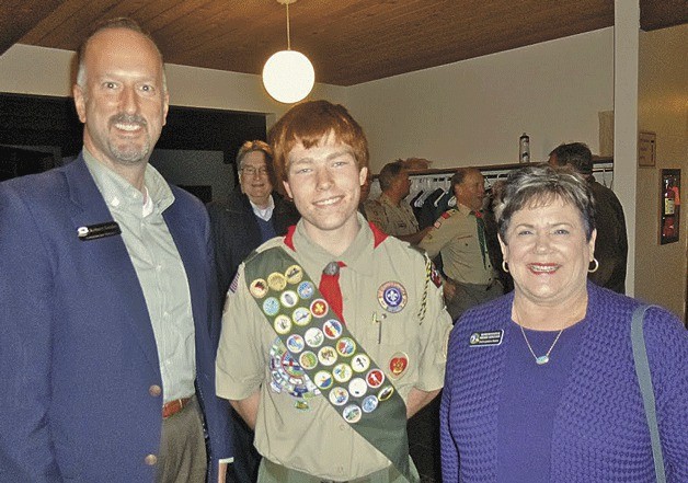 Boy Scout Nick Allen stands with Kitsap County Commissioner Rob Gelder and state Rep. Sherry Appleton.