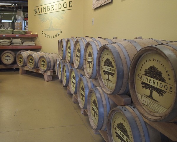 Barrels line the walls of the Bainbridge Organic Distillery’s tasting room