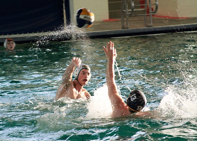 Spartan utility Rory Gallivan attempts to block a pass during the boys varsity water polo match against Peninsula High School Wed.