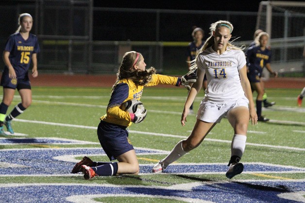 The Spartans’ Kamryn Coryell is turned away by the West Seattle goalkeeper during Bainbridge’s Metro win against the Wildcats Tuesday. Coryell had a number of amazing shots on goal that nearly slipped in.