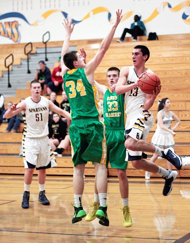 BHS senior guard Joey Blacker cuts along the baseline during the game at home against Bishop Blanchet Tuesday
