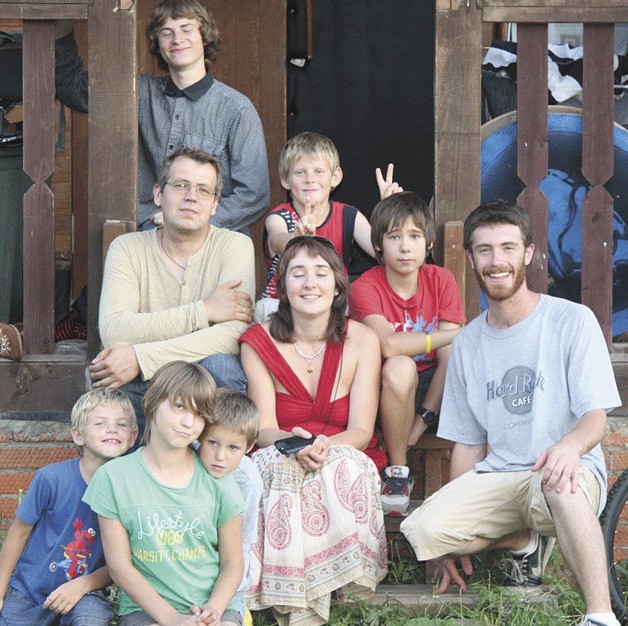 David Kroman gathers with Russian children and other volunteers during his visit last year to Kitezh. At right
