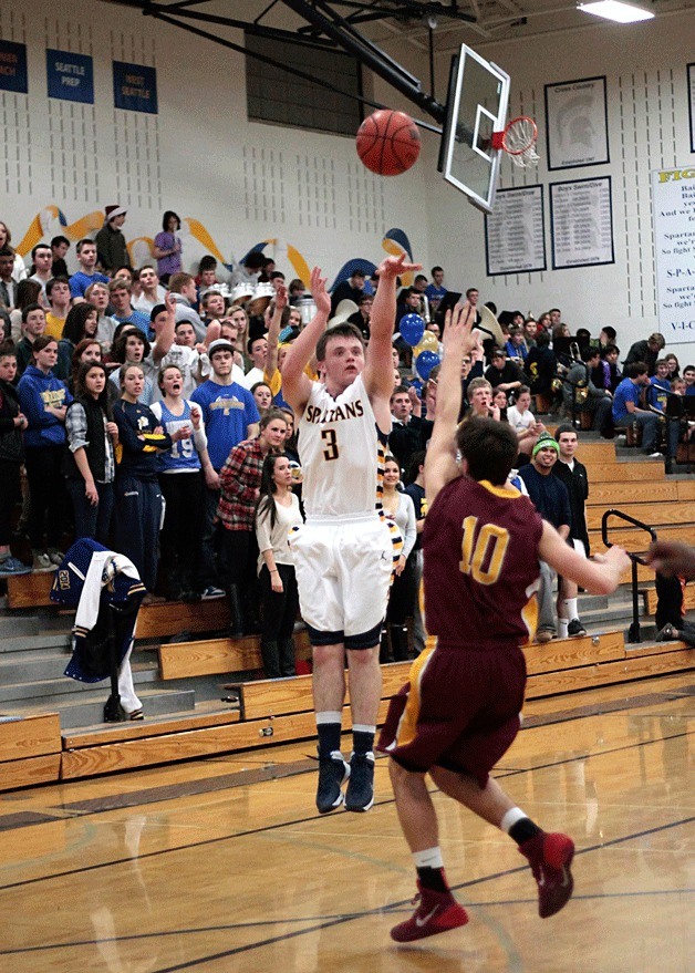 BHS junior guard Trent Schulte attempts a long shot three-pointer during the last home game of the regular season Friday
