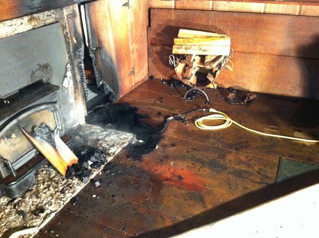 An extension cord left under a rug near a wood-burning stove started a small fire in a Bainbridge Island home Monday.