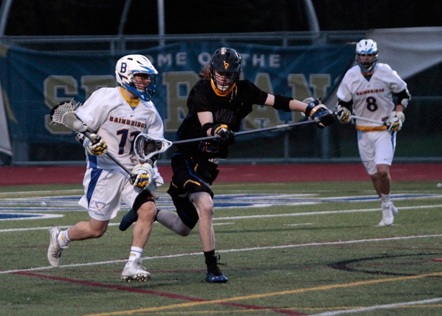 Nate Marx charges around the defenses of the visitors from Tahoma High Saturday