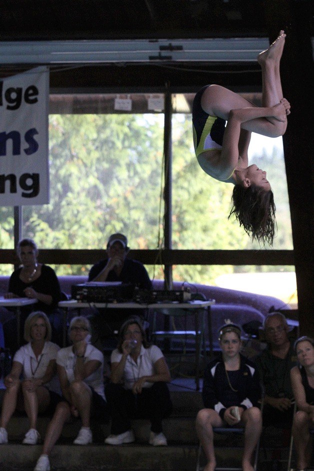 Rose Bandrowski competes in the diving event during the Spartan Relays at the Bainbridge Aquatics Center.