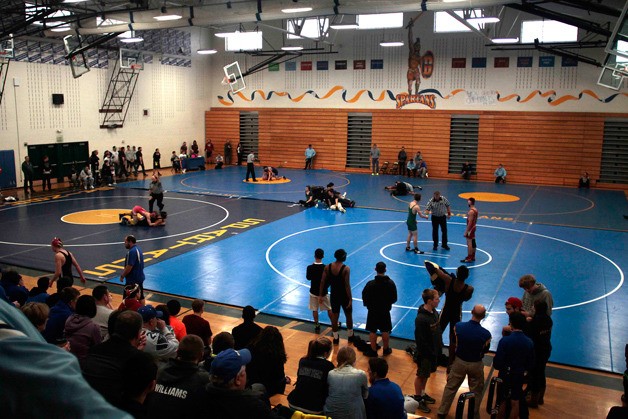 Wrestlers from 13 schools competed in this year's Island Invitational.