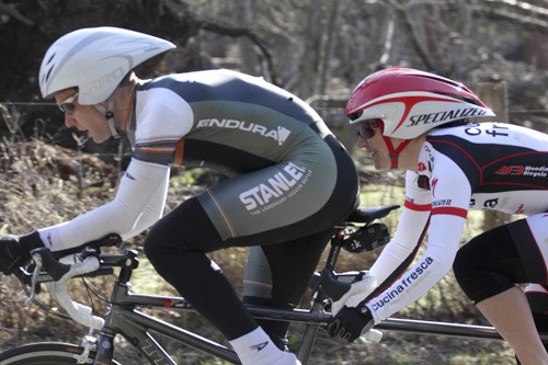 Niels Thogersen III and Jessica Cutler riding tandem.