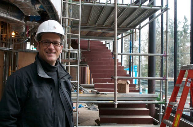 Architect Matthew Coates stands in front of the museum's grand stairway that will lead to the upstairs gallery.