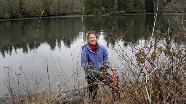 Wendy Westerlund helps the Weed Warriors remove invasive plants during an outing last fall. The group is looking for volunteers to help out at an upcoming work party Sept. 13 at Waterfront Park.