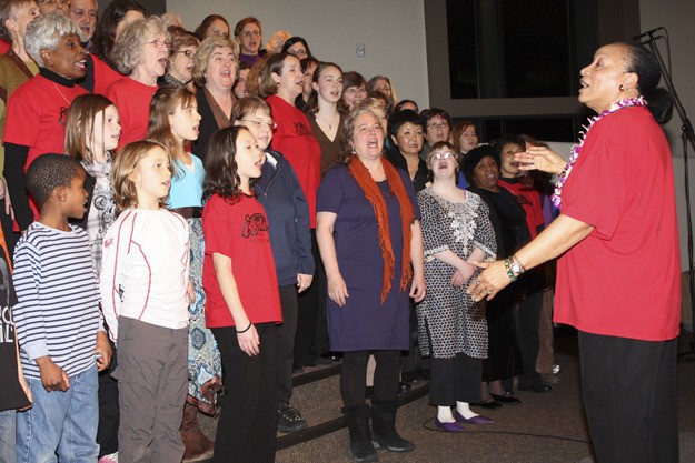 Pat Wright leads a song by the Martin Luther King Jr. Choir during the 2010 SingOut! event.