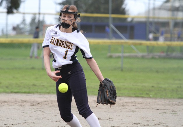 Sara Colley fires in a pitch during the Spartans’ home game against Lakeside (Nine Miles Falls).