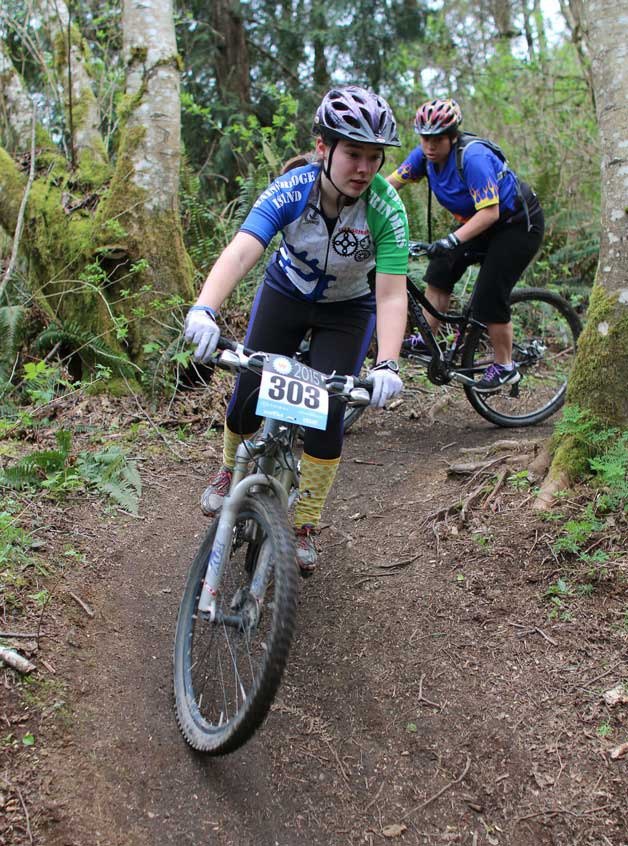 Bainbridge Gear Grinder Tessa Vroom on the trail during the bicycle team’s first race event last weekend in Port Gamble. Vroom finished second in her category at the event.