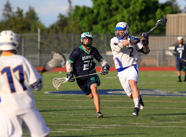 Bainbridge High senior Devon Turner looks to take a shot at the Woodinville goal early on in Tuesday’s home playoff game against the Falcons. The Spartans went on to win 16-7