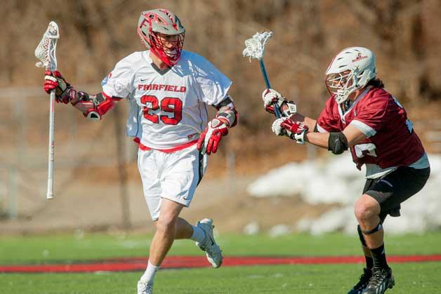 Jake Knostman takes the ball upfield for the Stags in earlier action for Fairfield University.