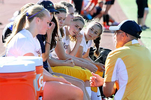 Spartan Coach Scott Druker offers advice to his Spartans during a recent Metro game.