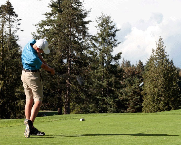 Spartan golfer Colin Campbell tees off at the first hole during the team’s match against Lakeside Thursday.