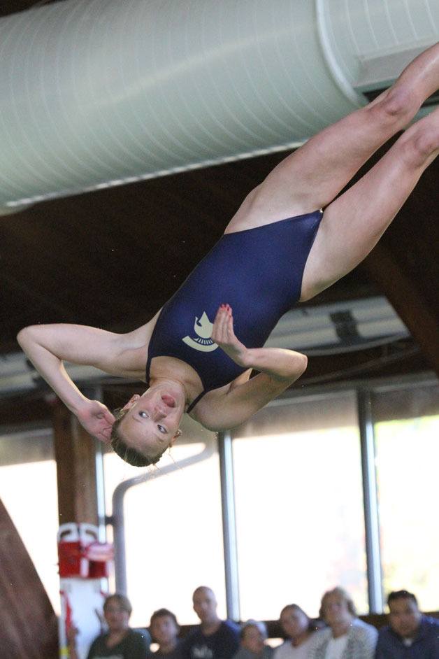 Zora Opalka completes her last dive for Bainbridge — a back somersault with 2½ twists — in the 1-meter diving event against Port Angeles. Opalka took first place for the Spartans with a score of 263.80.