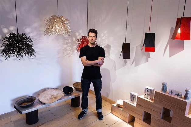 Brandon Perhacs stands in his new gallery