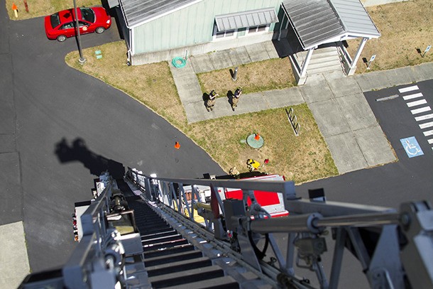 The view from the top: 100 feet above the ground in the extendable ladder during recent Bainbridge Island Fire Department drills.