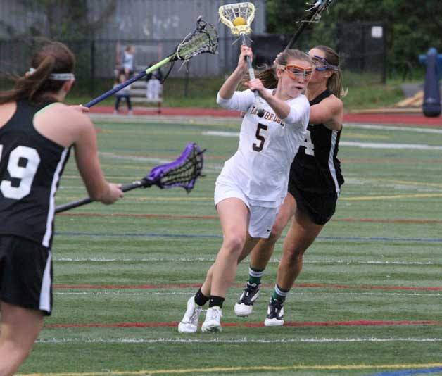 Mackenzie Chapman takes it to the goal during first-half action against Bainbridge.