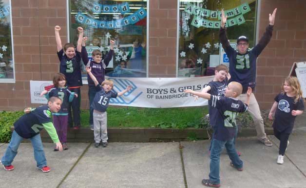 Kids at the Boys & Girls Club show their Seahawks spirit outside the club’s existing facility. Club officials announced the organization will move to the Coppertop Park.