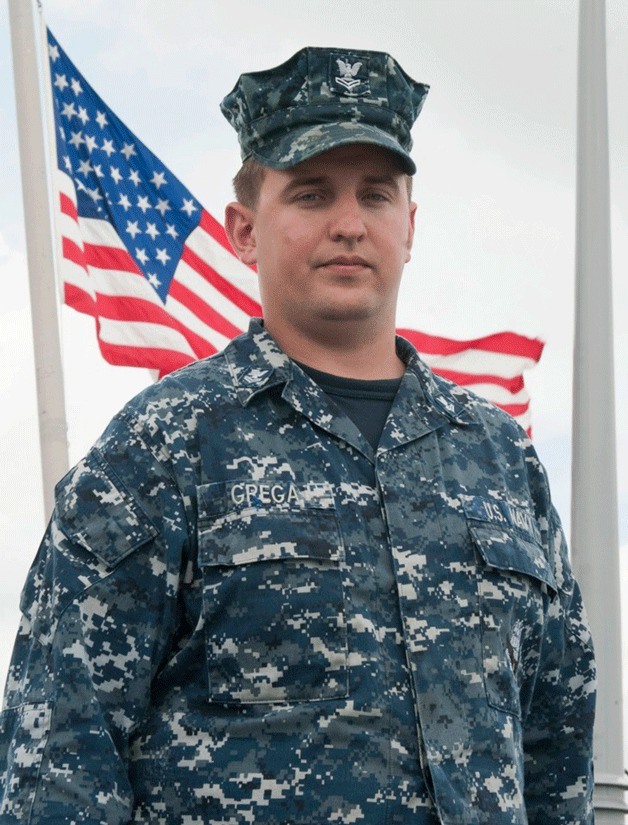 Navy Petty Officer 2nd Class Alexander V. Grega is serving aboard the Navy guided-missile destroyer USS Cole. He is a 2009 Bainbridge Island High School graduate.