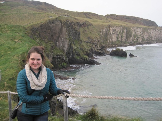 Regan Maria Wortley stands atop the Cliffs of Moher on the coast of County Clare